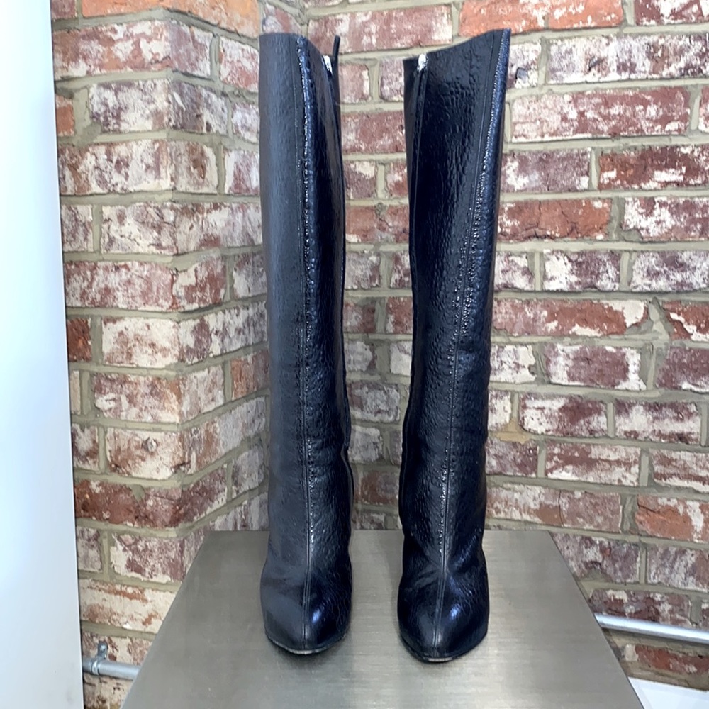 Giuseppe Zanotti over the knee embossed black leather boots.